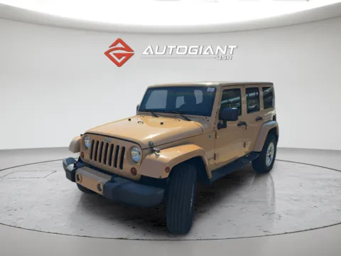 Brown 2013 Jeep Wrangler Unlimited Sahara for sale in Indianapolis, IN