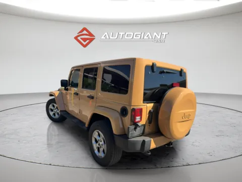 Another view of 2013 Jeep Wrangler Unlimited Sahara for sale in Indianapolis, IN at AutoGiant USA Indianapolis