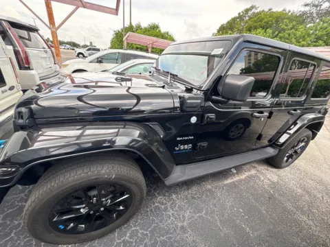 Black 2023 Jeep Wrangler Sahara 4xe for sale in Indianapolis, IN