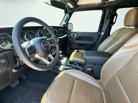 Photos of 2023 Jeep Wrangler Sahara 4xe for sale in Indianapolis, IN at AutoGiant USA Indianapolis