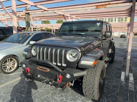 Gray 2021 Jeep Wrangler Unlimited Sahara for sale in Indianapolis, IN