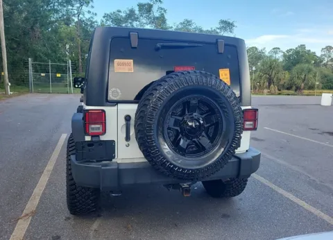 Another view of 2018 Jeep Wrangler JK Unlimited Sport for sale in Indianapolis, IN at AutoGiant USA Indianapolis