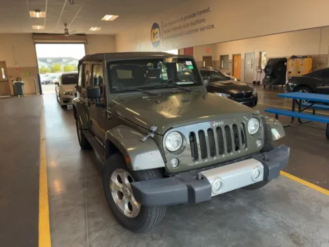 Photos of 2015 Jeep Wrangler Unlimited Sahara for sale in Indianapolis, IN at AutoGiant USA Indianapolis
