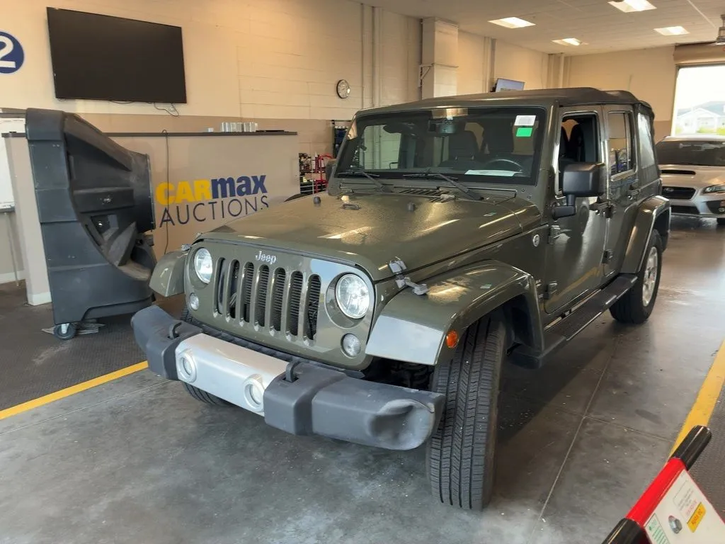 Green 2015 Jeep Wrangler Unlimited Sahara for sale in Indianapolis, IN