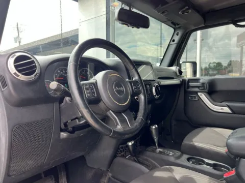 Photos of 2015 Jeep Wrangler Unlimited Sahara for sale in Indianapolis, IN at AutoGiant USA Indianapolis