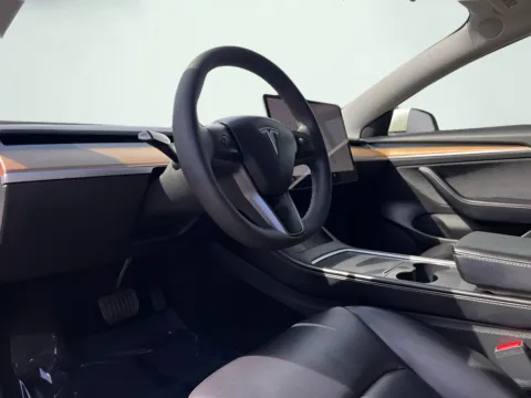 Photos of 2021 Tesla Model 3 Standard Range Plus for sale in Indianapolis, IN at AutoGiant USA Indianapolis