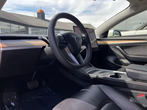 Photos of 2021 Tesla Model 3 Standard Range Plus for sale in Indianapolis, IN at AutoGiant USA Indianapolis