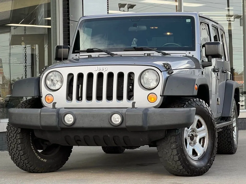 Silver 2015 Jeep Wrangler Unlimited Sport for sale in Indianapolis, IN