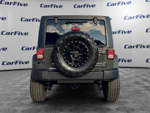 More photos of 2015 Jeep Wrangler Unlimited Sport at CarFive Salem, MA, MA