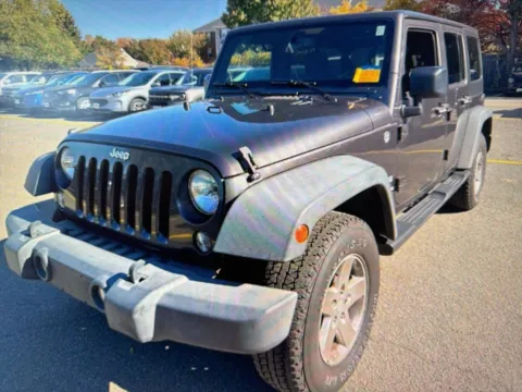 Another view of 2014 Jeep Wrangler Unlimited Sport for sale in Salem, MA at CarFive Salem, MA