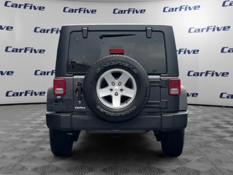 More photos of 2014 Jeep Wrangler Unlimited Sport at CarFive Salem, MA, MA