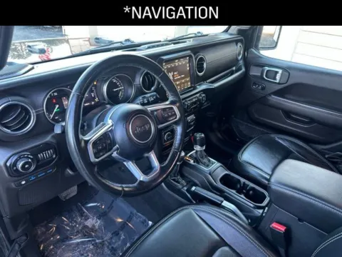 Another view of 2021 Jeep Wrangler Unlimited Sahara 4xe for sale in Milwaukee, WI at Diamond Jim's Motor Cars