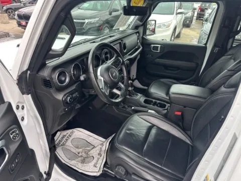 Another view of 2022 Jeep Wrangler Unlimited Sahara 4xe for sale in Milwaukee, WI at Diamond Jim's Motor Cars