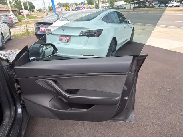 Tesla Model 3 photo 21