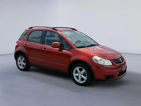 Orange 2009 Suzuki SX4 Auto AWD for sale in Knoxville, TN