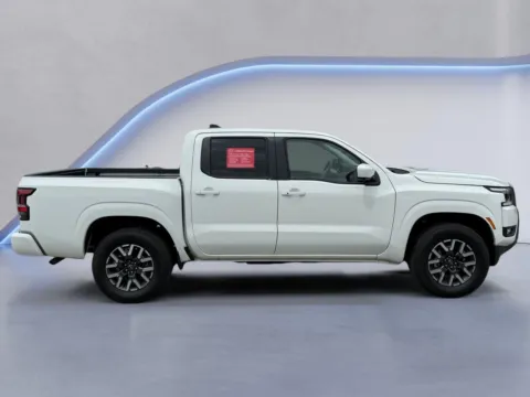 Photos of 2025 Nissan Frontier SL for sale in Alcoa, TN at Twin City Nissan