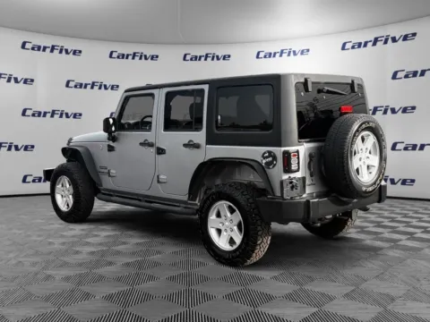 Another view of 2016 Jeep Wrangler Unlimited Sport for sale in Hooksett, NH at CarFive Hooksett, NH