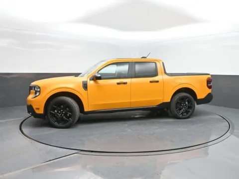 Orange 2026 Ford Maverick XLT for sale in Charles City, IA