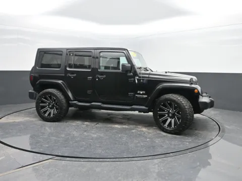 Photos of 2018 Jeep Wrangler JK Unlimited Sahara for sale in Charles City, IA at Mike Molstead Chevrolet, GMC