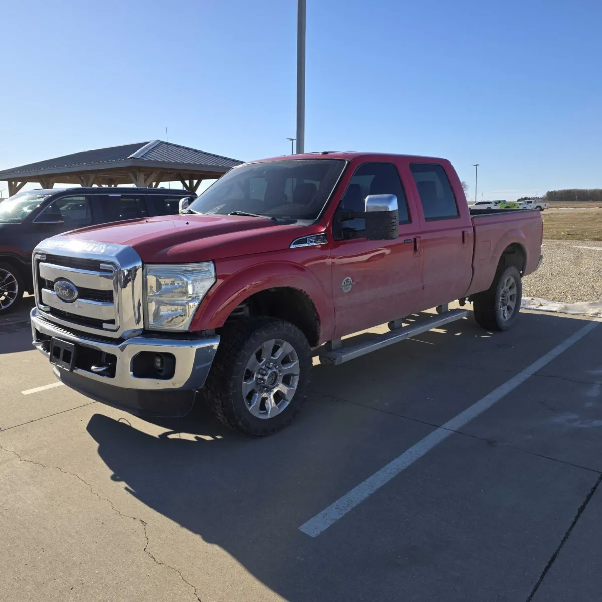 Red 2011 Ford Super Duty F-350 Lariat for sale in Charles City, IA