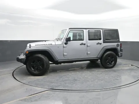 Silver 2016 Jeep Wrangler Unlimited Black Bear for sale in Charles City, IA