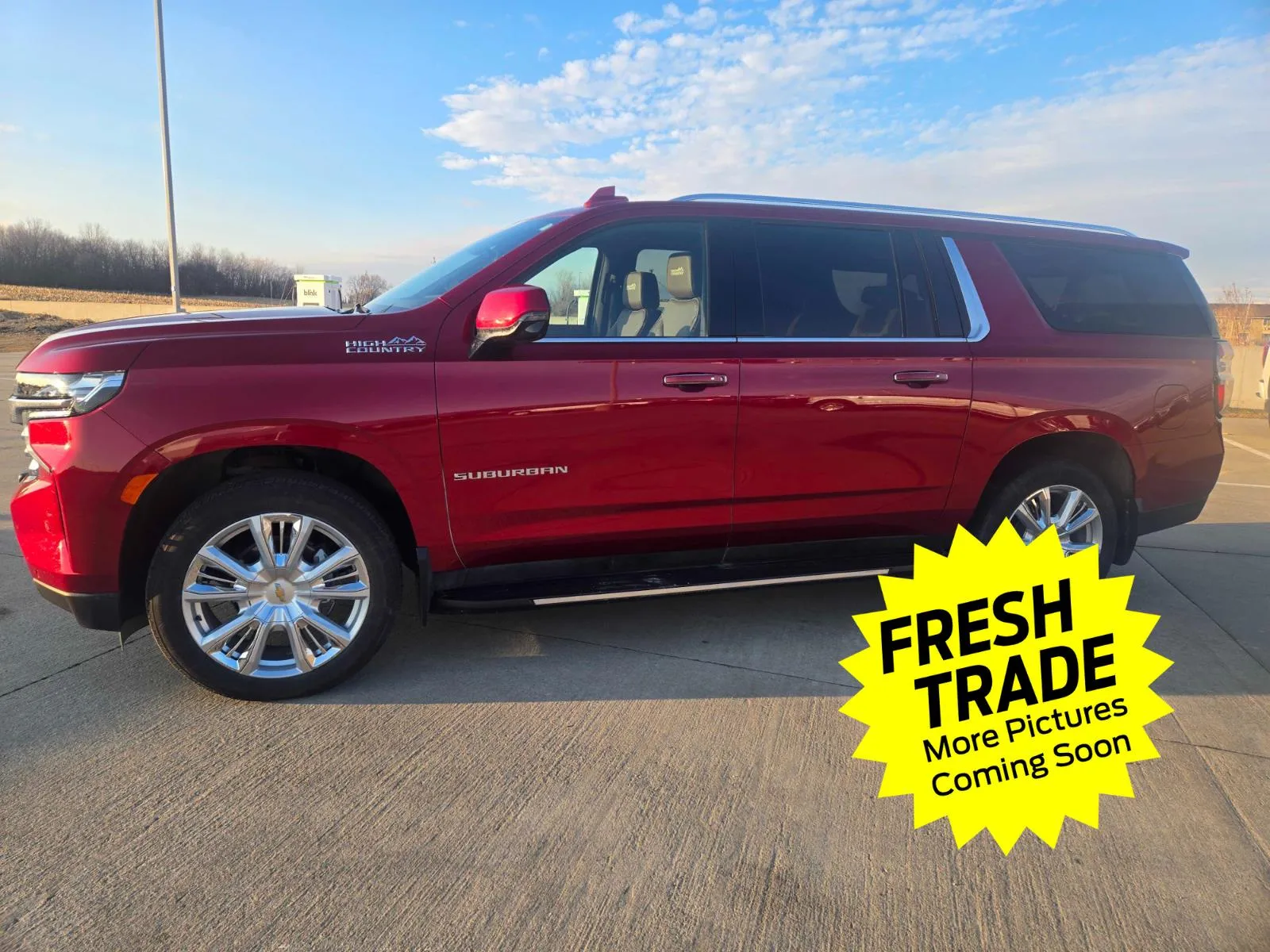 Red 2024 Chevrolet Suburban High Country for sale in Charles City, IA