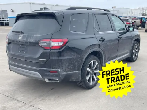 Photos of 2025 Honda Pilot Touring for sale in Charles City, IA at Mike Molstead Chevrolet, GMC