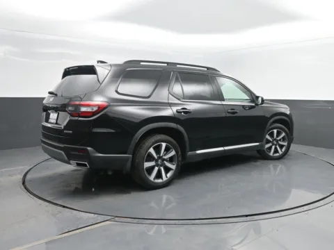 Photos of 2025 Honda Pilot Touring for sale in Charles City, IA at Mike Molstead Chevrolet, GMC