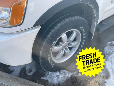 Photos of 2012 NISSAN TITAN for sale in Charles City, IA at Mike Molstead Chevrolet, GMC