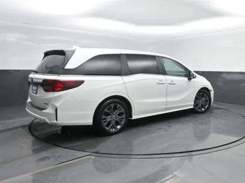 Photos of 2025 Honda Odyssey Touring for sale in Charles City, IA at Mike Molstead Chevrolet, GMC