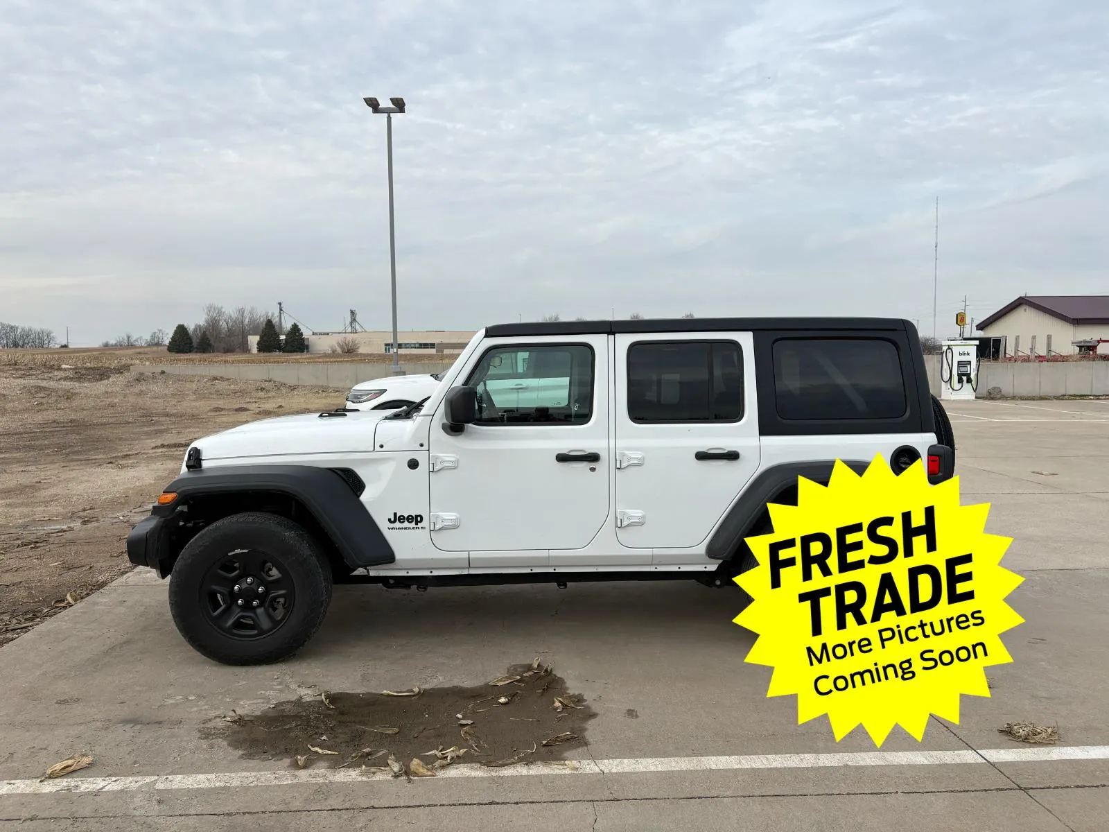 White 2025 Jeep Wrangler Sport for sale in Charles City, IA