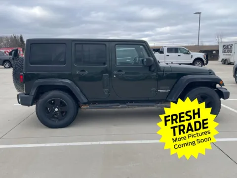 Another view of 2011 Jeep Wrangler Unlimited Sport for sale in Charles City, IA at Mike Molstead Chevrolet, GMC