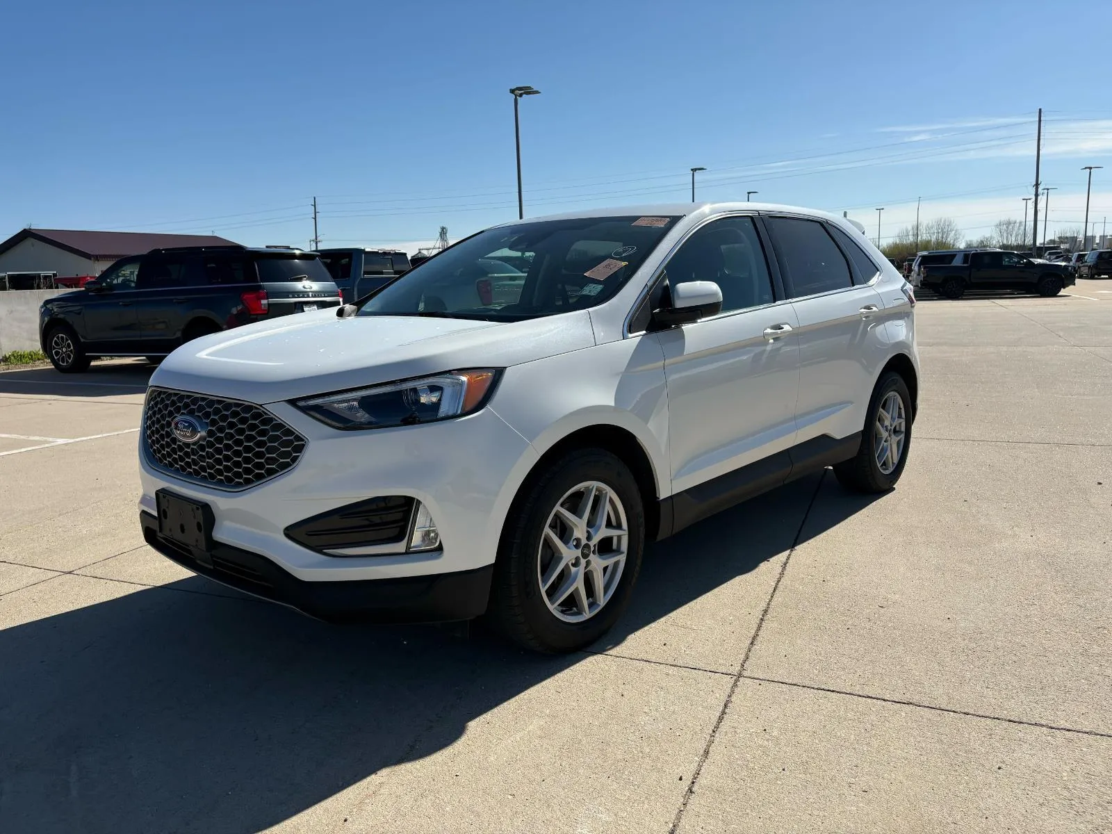 Black 2023 Ford Edge SEL for sale in Charles City, IA