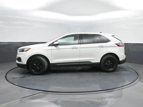 Black 2023 Ford Edge SEL for sale in Charles City, IA