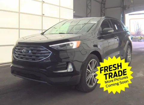 Black 2023 Ford Edge Titanium for sale in Charles City, IA