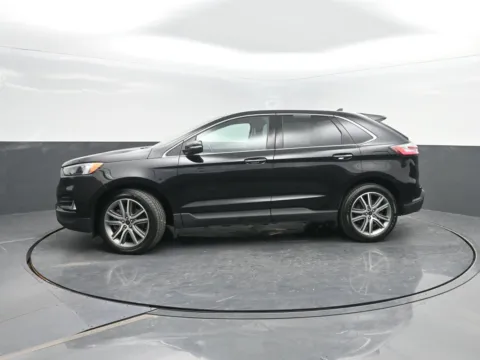 Black 2023 Ford Edge Titanium for sale in Charles City, IA
