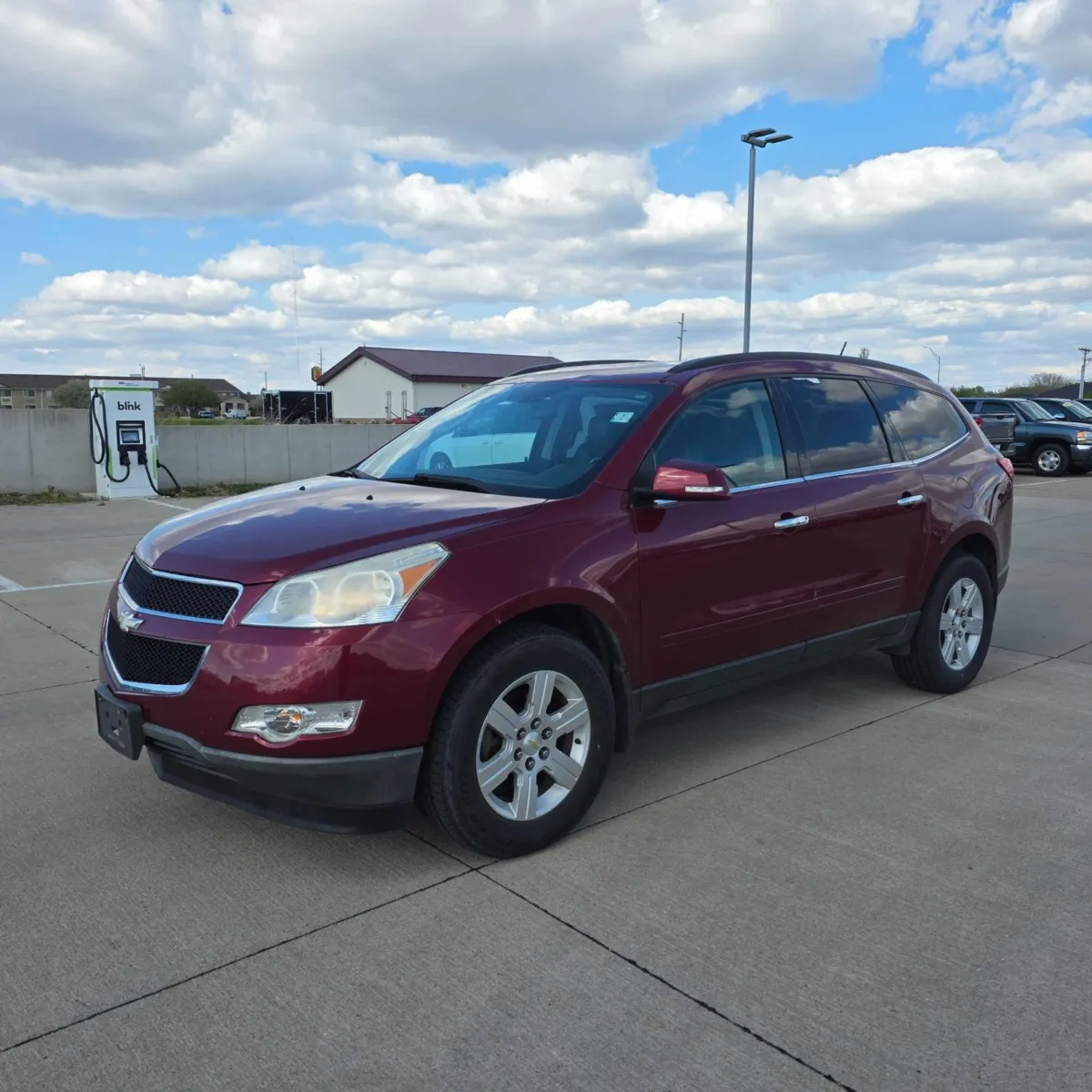Red 2011 Chevrolet Traverse LT w/2LT for sale in Charles City, IA
