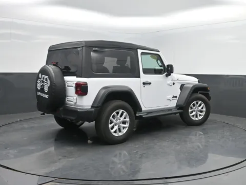 Photos of 2023 Jeep Wrangler Sport S for sale in Charles City, IA at Mike Molstead Chevrolet, GMC