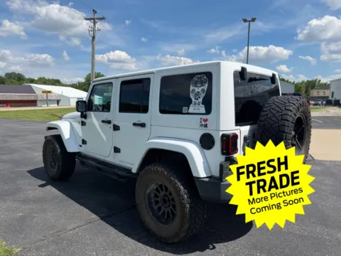 Photos of 2012 Jeep Wrangler Unlimited Sahara for sale in Charles City, IA at Mike Molstead Chevrolet, GMC