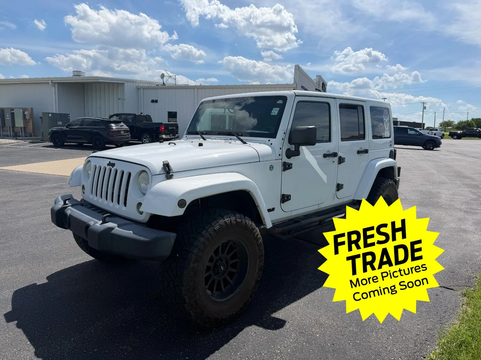 White 2012 Jeep Wrangler Unlimited Sahara for sale in Charles City, IA