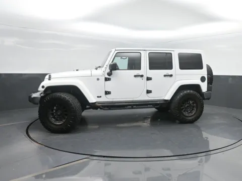 White 2012 Jeep Wrangler Unlimited Sahara for sale in Charles City, IA