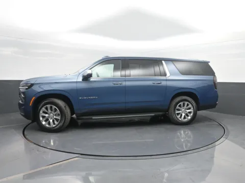 Blue 2026 Chevrolet Suburban Premier for sale in Charles City, IA