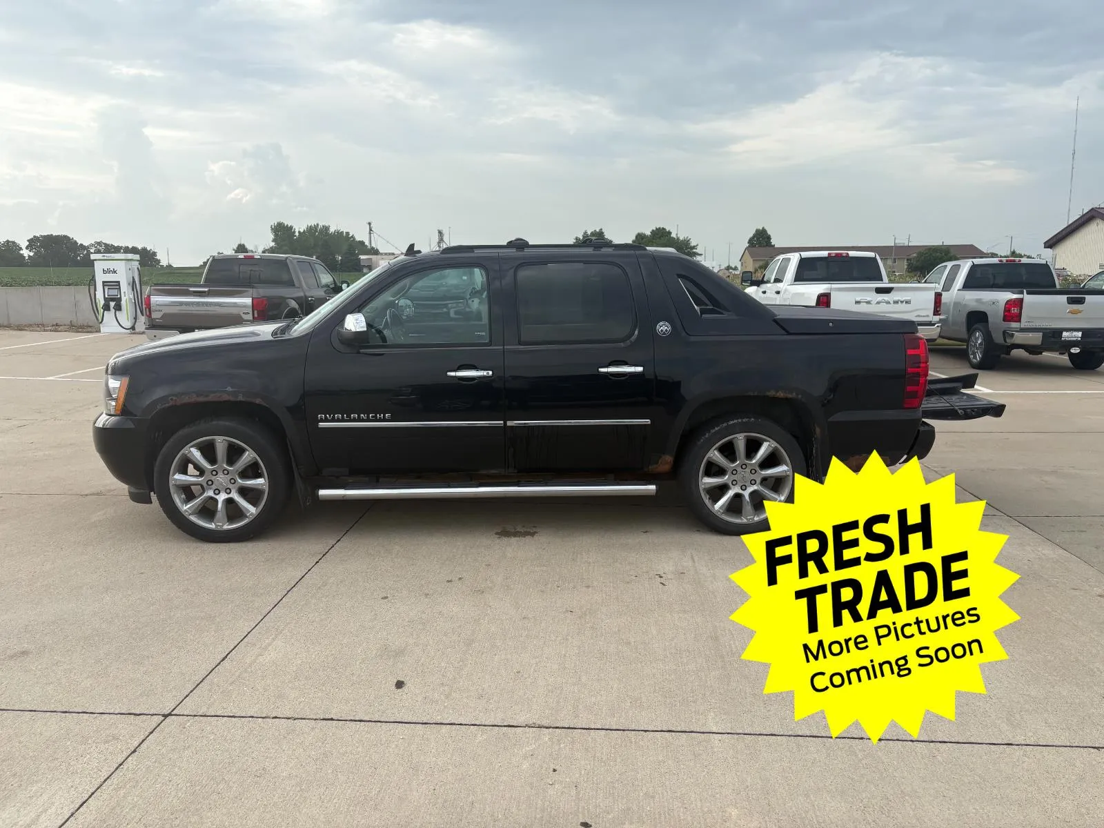Black 2013 Chevrolet Avalanche LTZ for sale in Charles City, IA