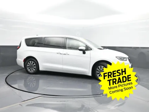 Photos of 2023 Chrysler Pacifica Hybrid Touring L for sale in Charles City, IA at Mike Molstead Chevrolet, GMC