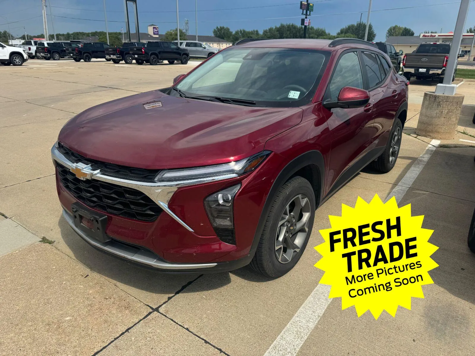 Red 2025 Chevrolet Trax LT for sale in Charles City, IA