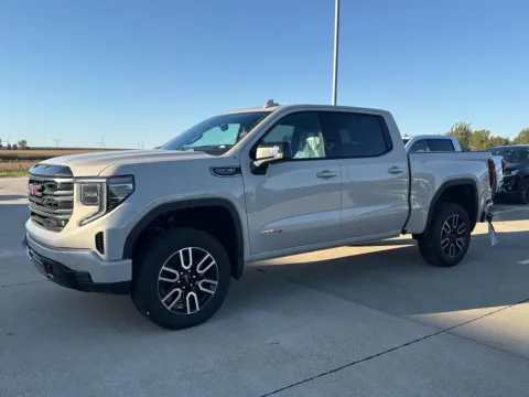 Beige 2026 GMC Sierra 1500 AT4 for sale in Charles City, IA