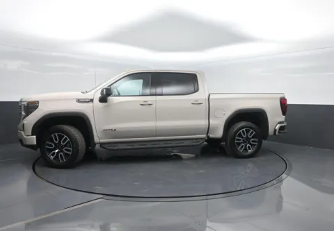 Beige 2026 GMC Sierra 1500 AT4 for sale in Charles City, IA