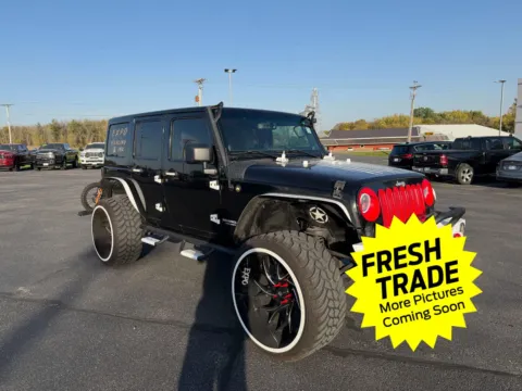 Photos of 2013 Jeep Wrangler Unlimited Sahara for sale in Charles City, IA at Mike Molstead Chevrolet, GMC