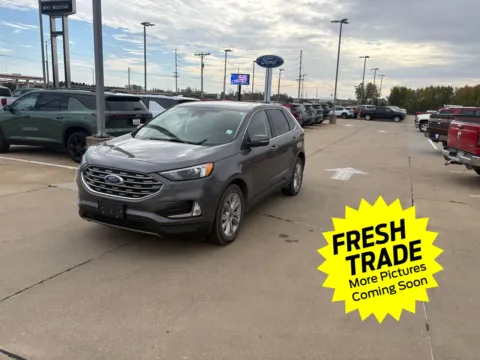 Gray 2023 Ford Edge Titanium for sale in Charles City, IA