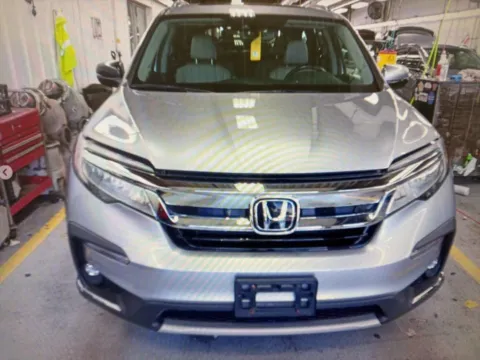 Photos of 2021 Honda Pilot Touring for sale in Plaistow, NH at CarFive Plaistow, NH